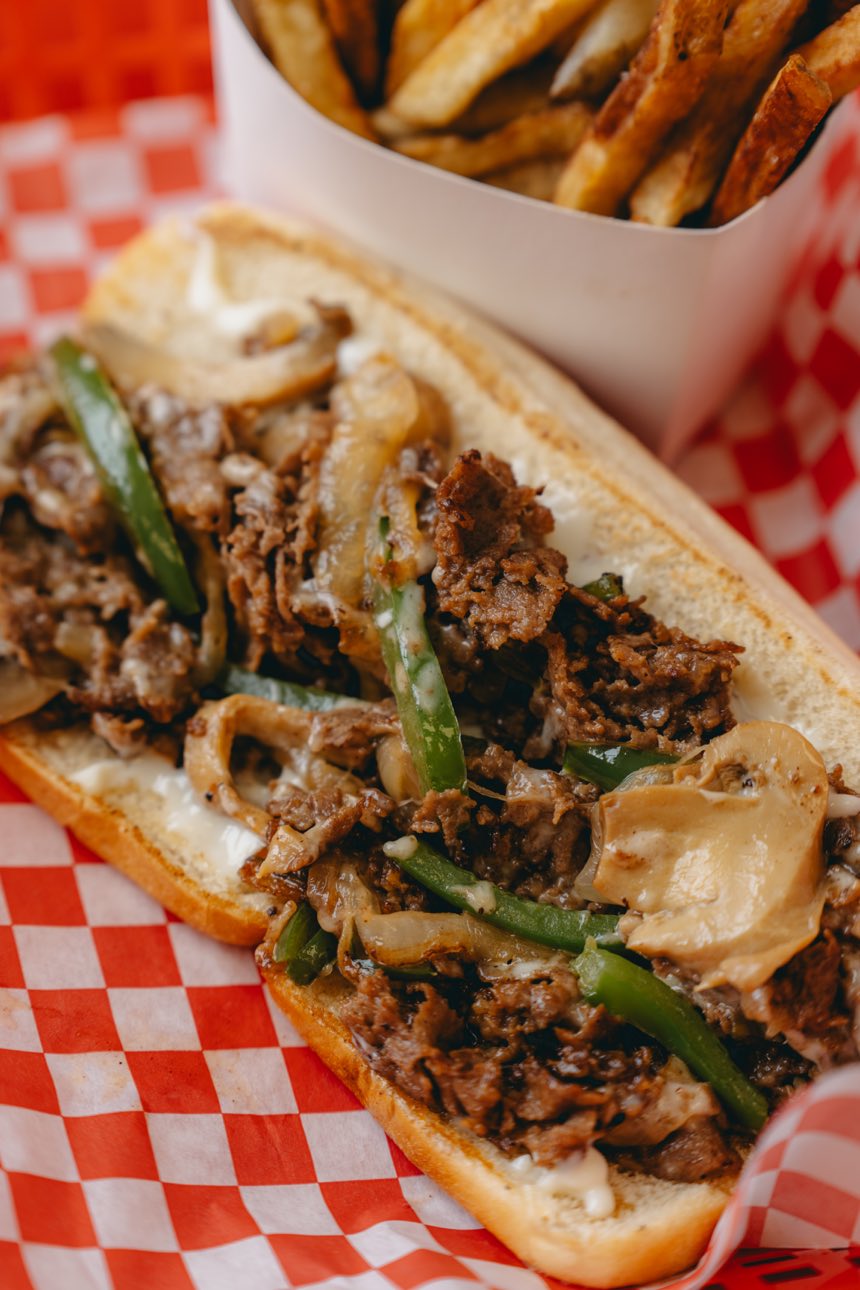 Philly cheesesteak with peppers, onions and melted provolone
