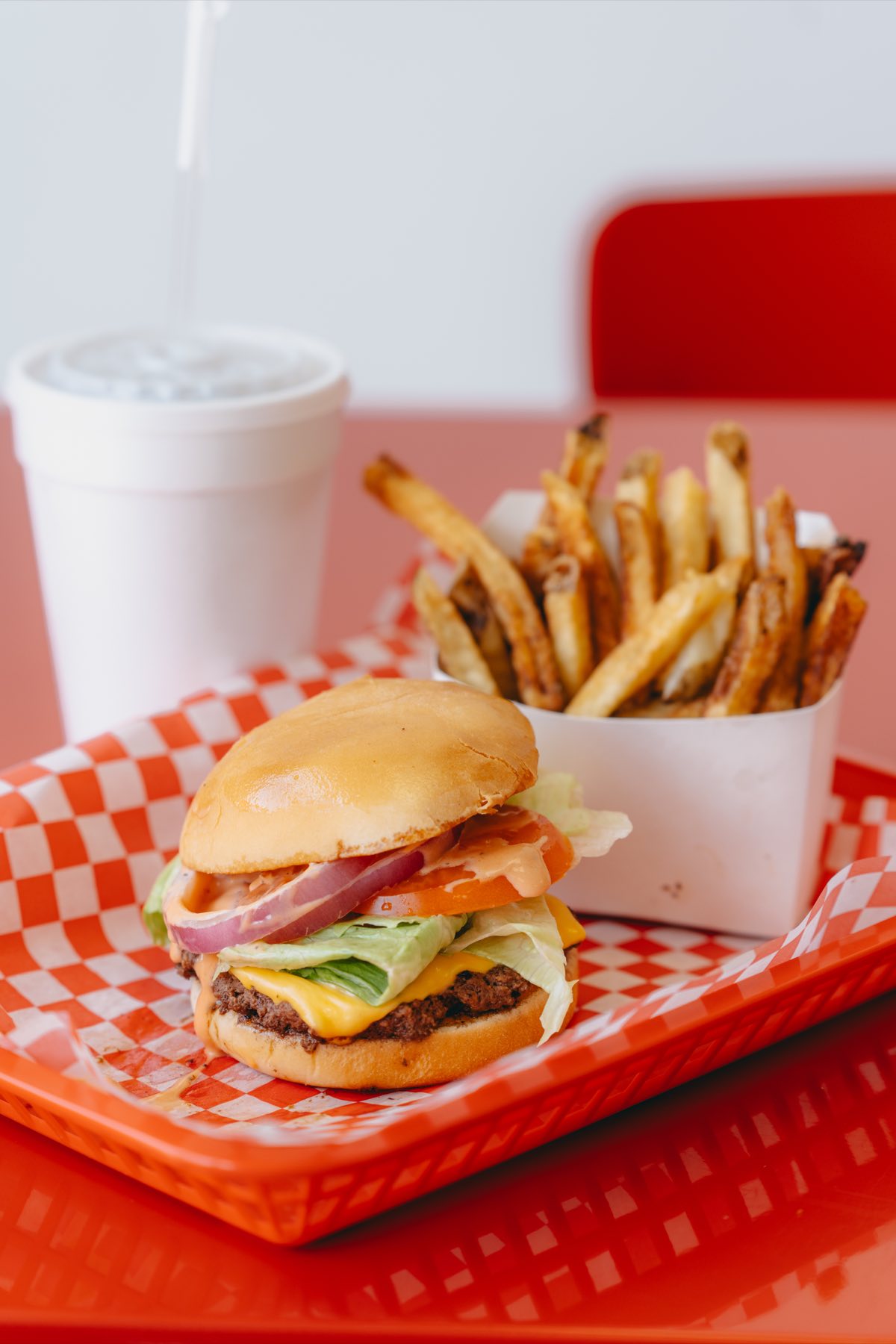 An Et Al cheeseburger with hand-cut fries