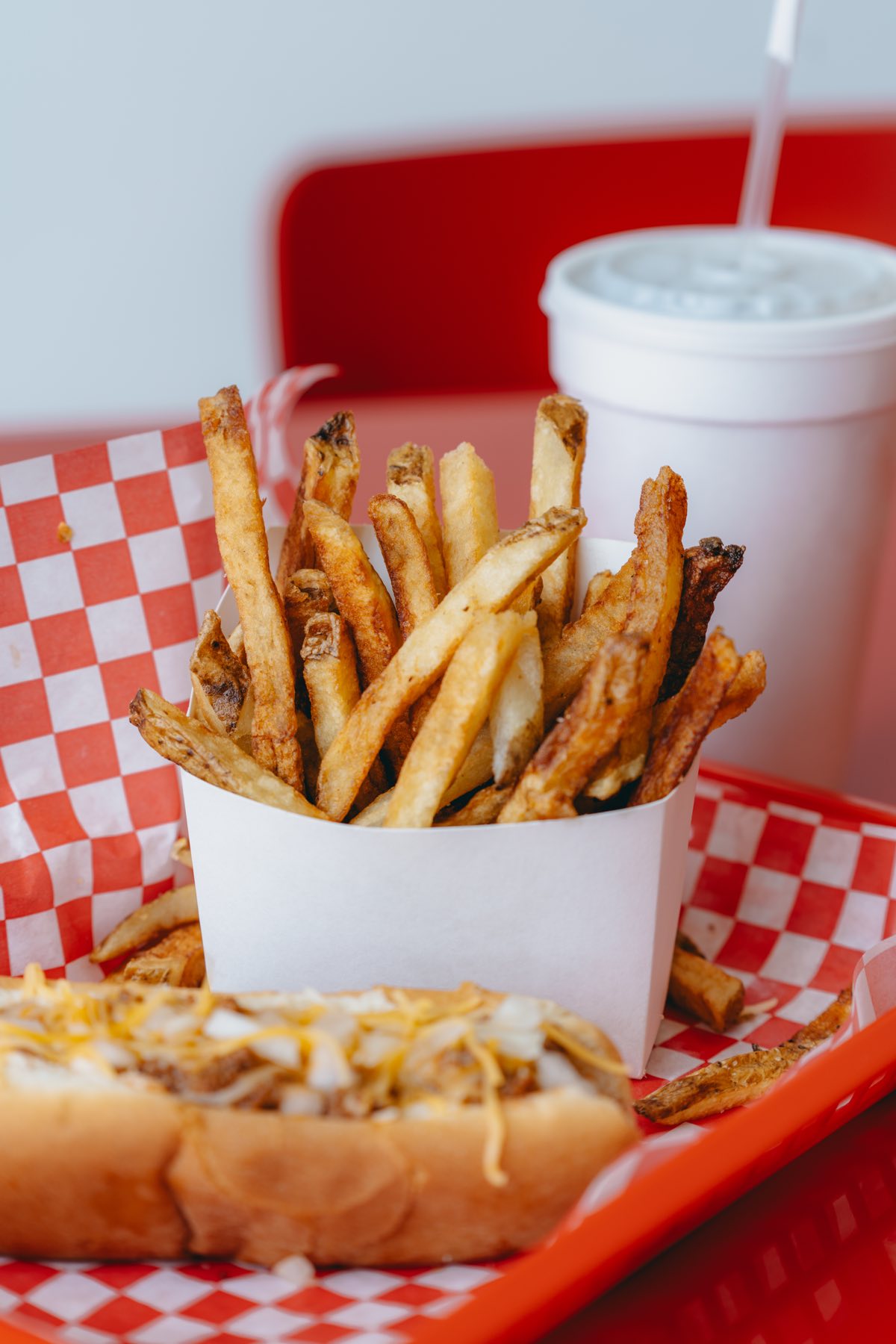 A basket of hand-cut fries fried in beef tallow